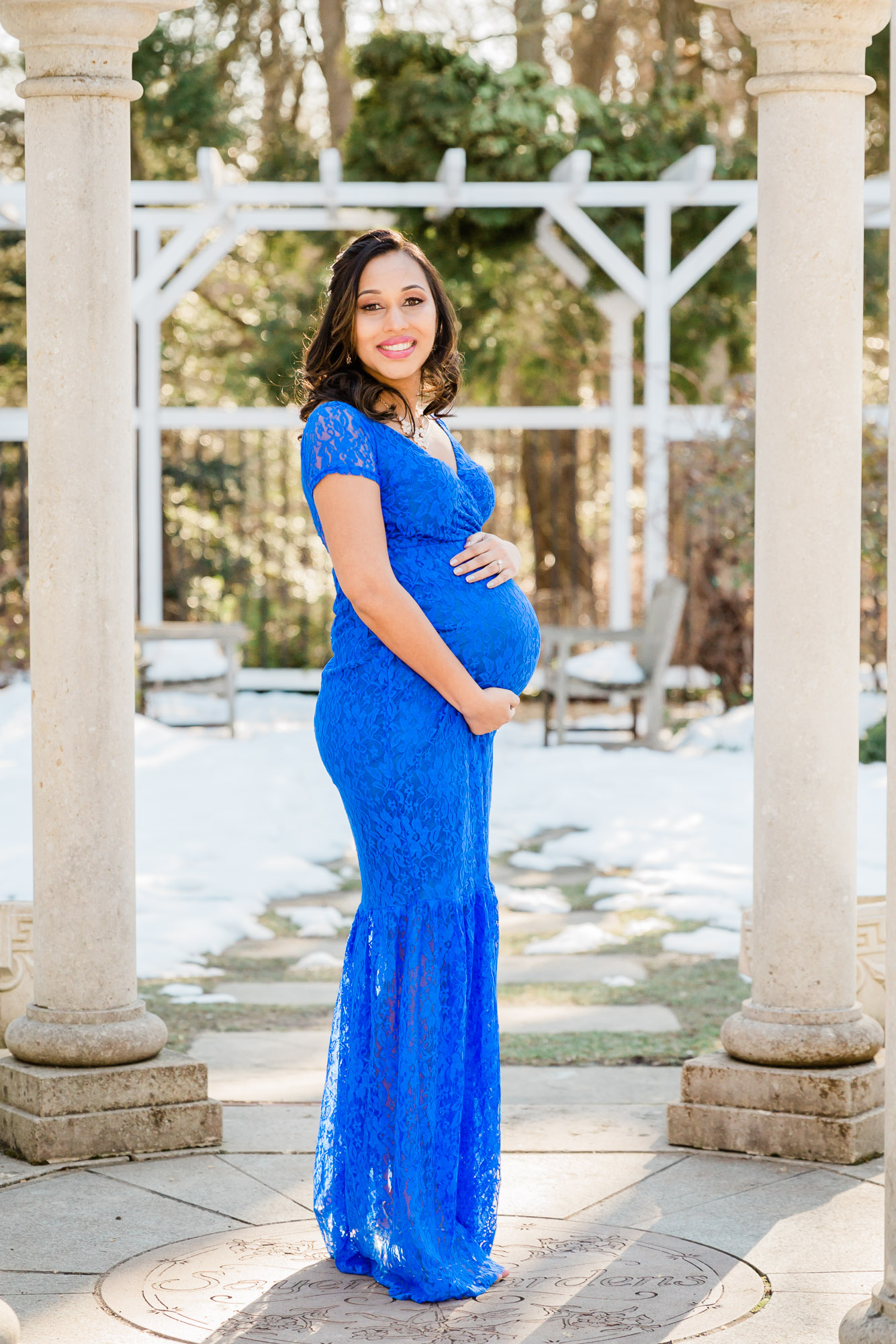 stunning maternity portrait blue lace dress